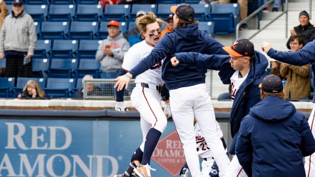 Griff O'Ferrall celebrates after hitting a home run during the Virginia baseball game against Hofstra at Disharoon Park.